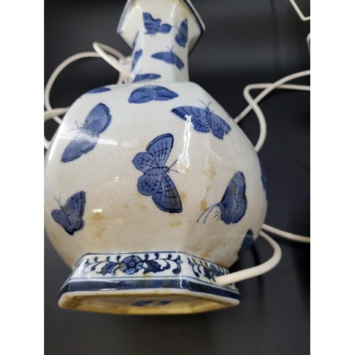 112 - Pair of of Oriental Blue & White Porcelain Vases with Butterfly Design Converted to Electric Lam... 