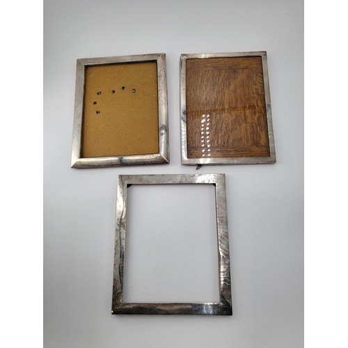 66 - Three Sterling Silver Photo Frames Measures Largest 24.5cm Tall by 20.5cm Wide Smallest 24cm tall by... 