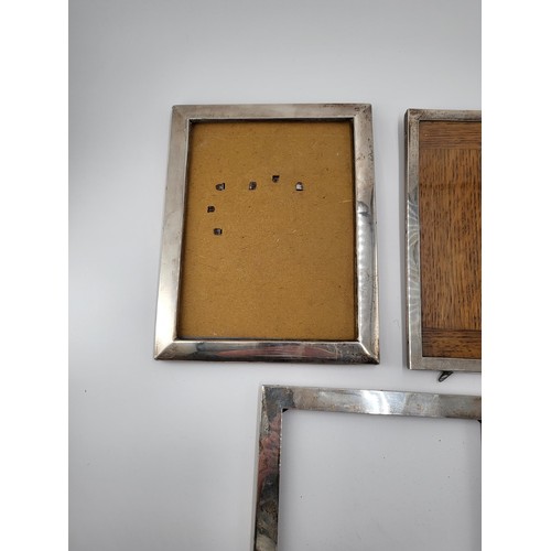 66 - Three Sterling Silver Photo Frames Measures Largest 24.5cm Tall by 20.5cm Wide Smallest 24cm tall by... 