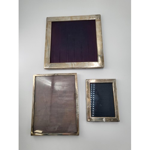 67 - Three Sterling Silver Photo Frames Measures Largest 24.5cm Tall by 24.5cm Wide Smallest 16cm tall by... 