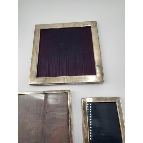 67 - Three Sterling Silver Photo Frames Measures Largest 24.5cm Tall by 24.5cm Wide Smallest 16cm tall by... 