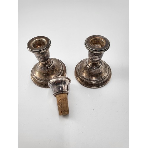 68 - Sterling Silver pigmy Candlesticks along with Sterling Wine Bottle Stopper Candlesticks Measure 8cm ... 