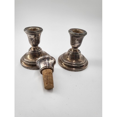 68 - Sterling Silver pigmy Candlesticks along with Sterling Wine Bottle Stopper Candlesticks Measure 8cm ... 