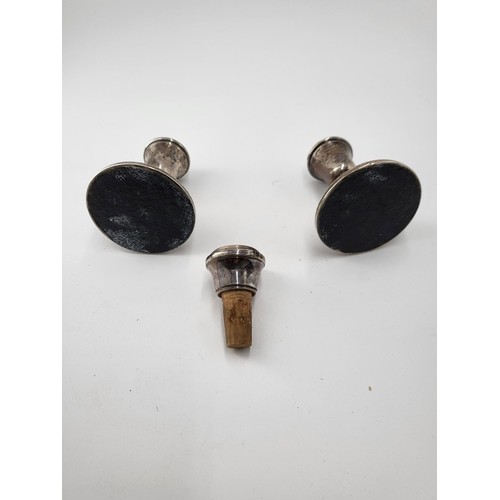 68 - Sterling Silver pigmy Candlesticks along with Sterling Wine Bottle Stopper Candlesticks Measure 8cm ... 