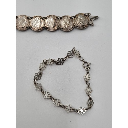 85 - Collection of Silver Charm Bracelets along with Two Brooches ( Total Weight 173g)