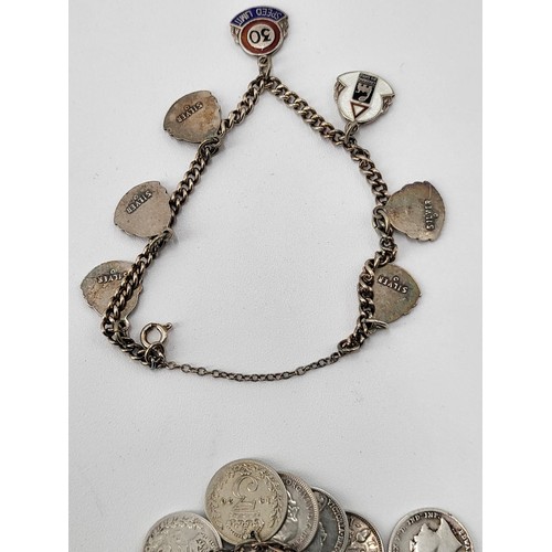 85 - Collection of Silver Charm Bracelets along with Two Brooches ( Total Weight 173g)