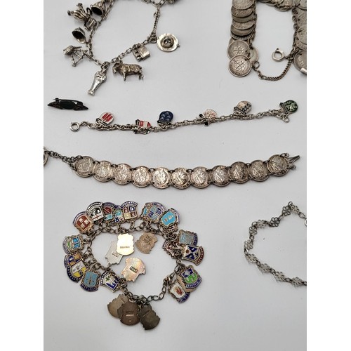 85 - Collection of Silver Charm Bracelets along with Two Brooches ( Total Weight 173g)