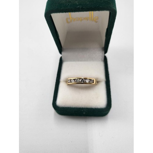 93 - 18ct Gold Six Stone Diamond Band Hallmarked 750 & Ring Size O ( Weighs 3.27g ) the item is in Lo... 