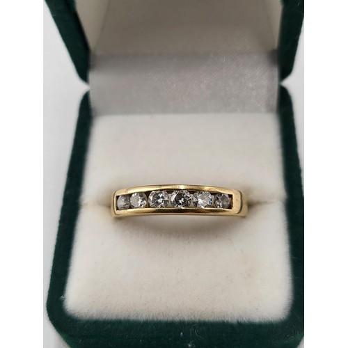 93 - 18ct Gold Six Stone Diamond Band Hallmarked 750 & Ring Size O ( Weighs 3.27g ) the item is in Lo... 
