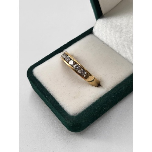 93 - 18ct Gold Six Stone Diamond Band Hallmarked 750 & Ring Size O ( Weighs 3.27g ) the item is in Lo... 