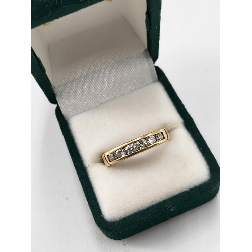 93 - 18ct Gold Six Stone Diamond Band Hallmarked 750 & Ring Size O ( Weighs 3.27g ) the item is in Lo... 