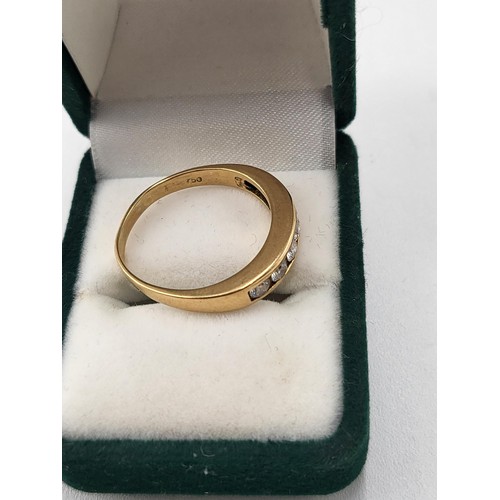 93 - 18ct Gold Six Stone Diamond Band Hallmarked 750 & Ring Size O ( Weighs 3.27g ) the item is in Lo... 
