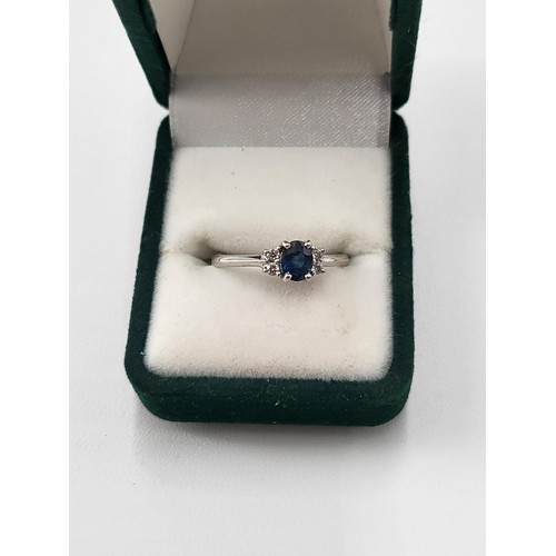 97 - 18ct White Gold Diamond & Sapphire Ring hallmarked 750 Ring Size K ( Weighs 2.1g) Nice Condition