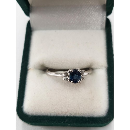 97 - 18ct White Gold Diamond & Sapphire Ring hallmarked 750 Ring Size K ( Weighs 2.1g) Nice Condition
