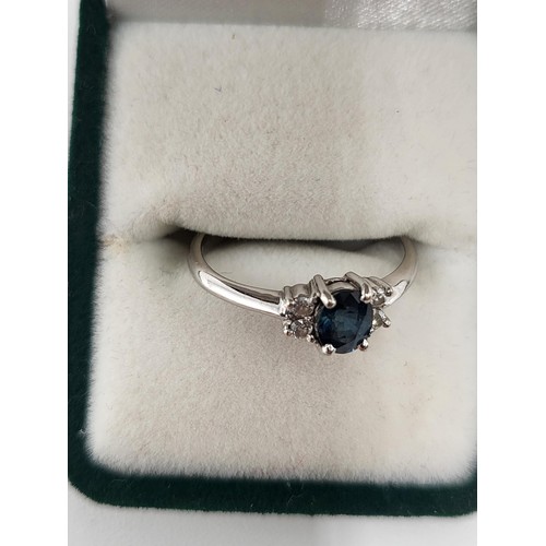 97 - 18ct White Gold Diamond & Sapphire Ring hallmarked 750 Ring Size K ( Weighs 2.1g) Nice Condition