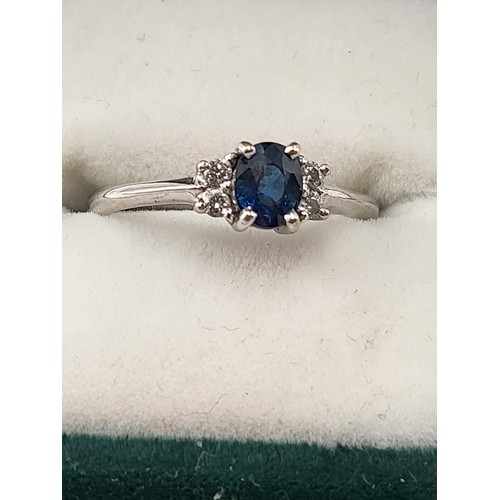 97 - 18ct White Gold Diamond & Sapphire Ring hallmarked 750 Ring Size K ( Weighs 2.1g) Nice Condition
