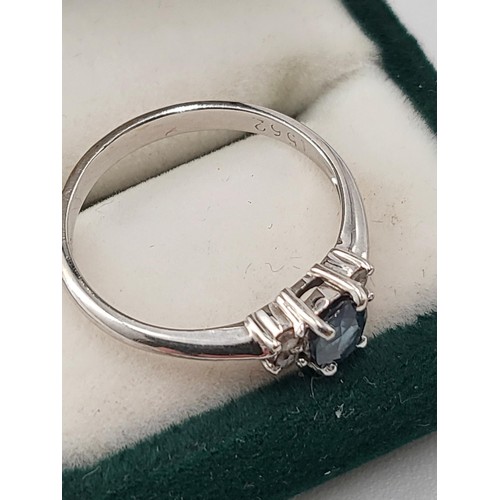 97 - 18ct White Gold Diamond & Sapphire Ring hallmarked 750 Ring Size K ( Weighs 2.1g) Nice Condition