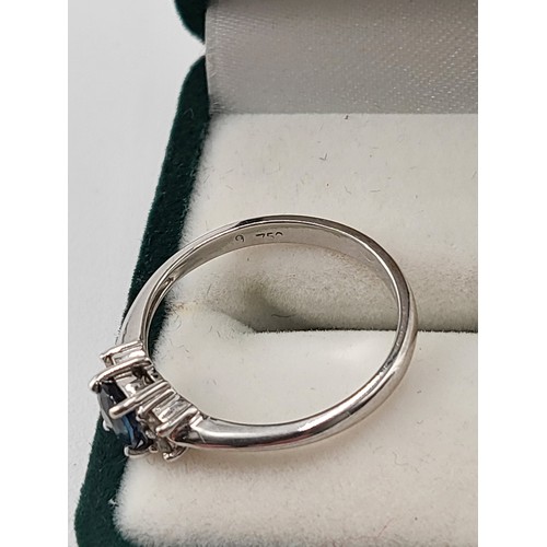 97 - 18ct White Gold Diamond & Sapphire Ring hallmarked 750 Ring Size K ( Weighs 2.1g) Nice Condition