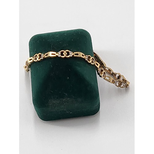 98 - 18ct Gold & Cubic Zirconia Love Heart Bracelet Fully Hallmarked 750 ( Weighs 7.5g) Measures 18cm... 