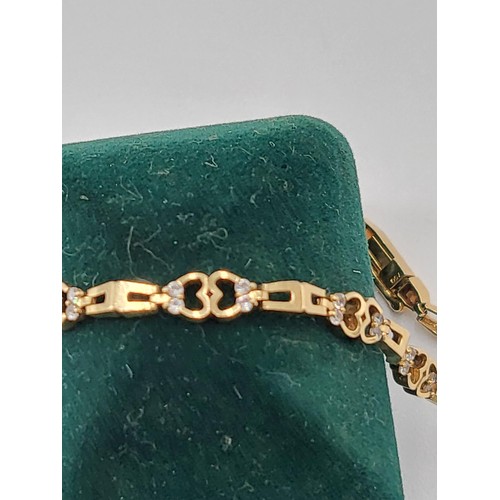98 - 18ct Gold & Cubic Zirconia Love Heart Bracelet Fully Hallmarked 750 ( Weighs 7.5g) Measures 18cm... 
