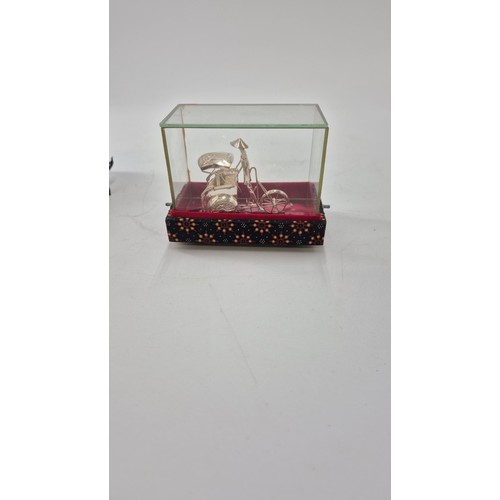 124 - Silver Oriental Rickshaw & Driver in Glass Case & Box Height 8cm x Length 10cm x Width 6cm