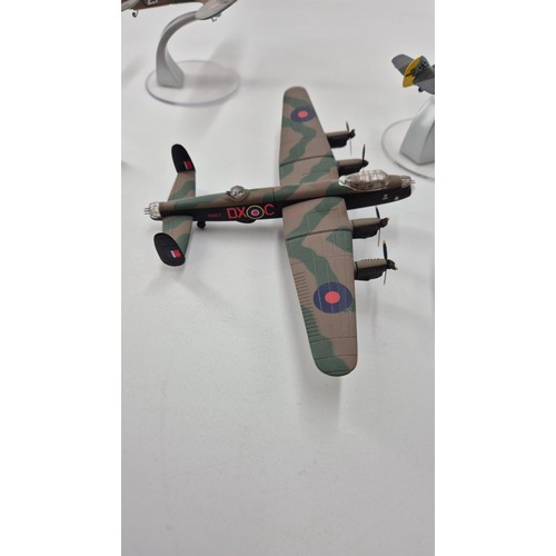 144 - Five Model Corgi Airplanes Lancaster x 2, Length 15cm x Wings 22cmSpitfire Length 13cm x Wings 16cm ... 