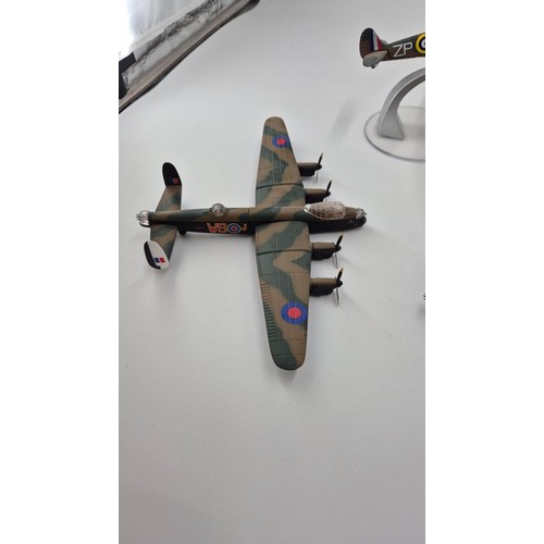 144 - Five Model Corgi Airplanes Lancaster x 2, Length 15cm x Wings 22cmSpitfire Length 13cm x Wings 16cm ... 