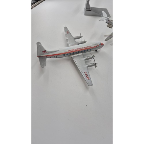 145 - Five Model Corgi AirplanesDakota Length 14cm Wings 20cm Sunderland Length 19cm Wings 24cm Mustang Le... 