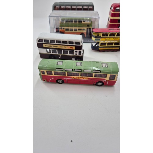 157 - Seven Diecast Model Corgi Buses, one Corgi Tram & Matchbox Tram