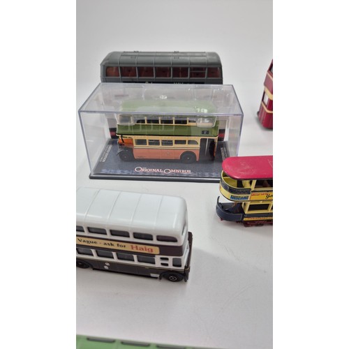 157 - Seven Diecast Model Corgi Buses, one Corgi Tram & Matchbox Tram