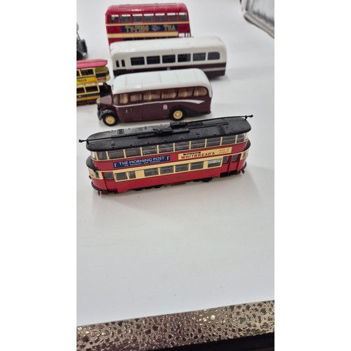 157 - Seven Diecast Model Corgi Buses, one Corgi Tram & Matchbox Tram