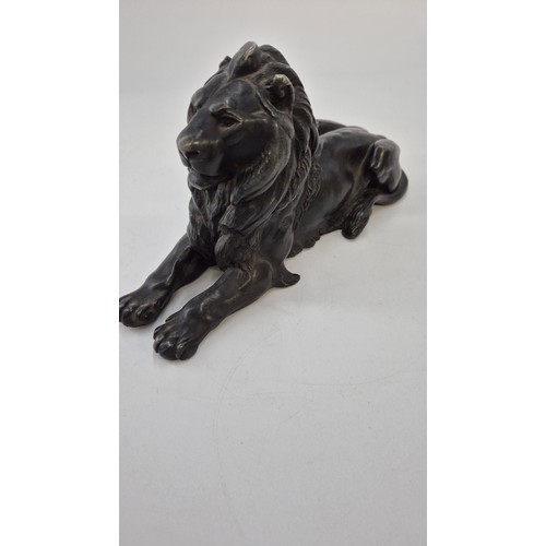 166 - Hollow Cast Metal Lion Statue Length 25cmHeight 13cm