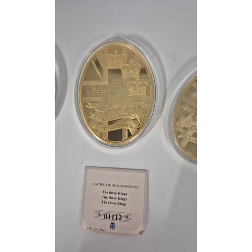 10 - Three Gold Plated with Swarovski Stone Commemorative Coins, 