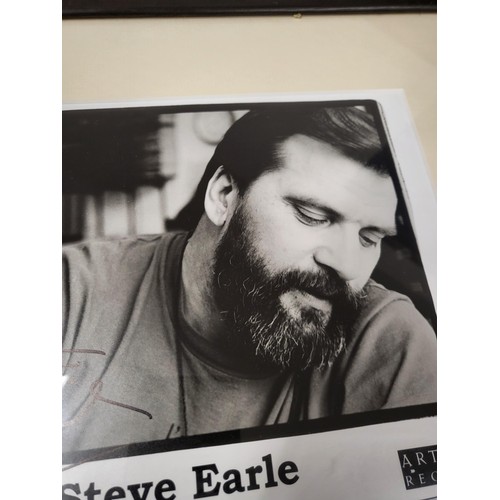 63 - Steve Earle Signed Photo from Artemis Records Measures 40cm Wide by 33.5cm Tall