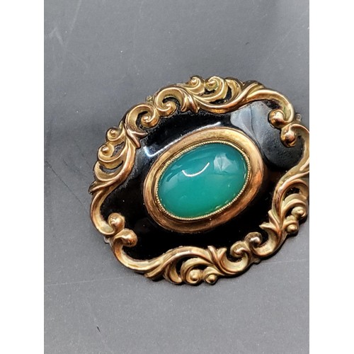 58 - Yellow Metal Brooch with Central Cabochon