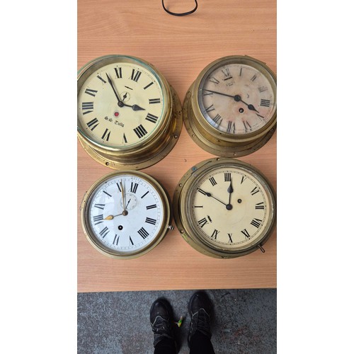 340 - Four Brass Bulkhead Clocks