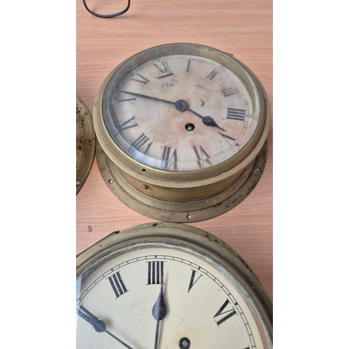 340 - Four Brass Bulkhead Clocks