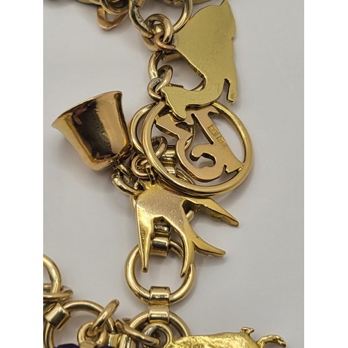 3 - 9ct Gold Charm Bracelet Weighs 28.4g Measures 16cm Long When Unclasped Fully Hallmarked