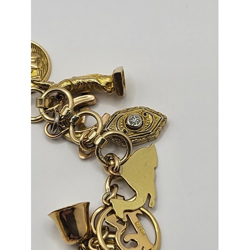 3 - 9ct Gold Charm Bracelet Weighs 28.4g Measures 16cm Long When Unclasped Fully Hallmarked