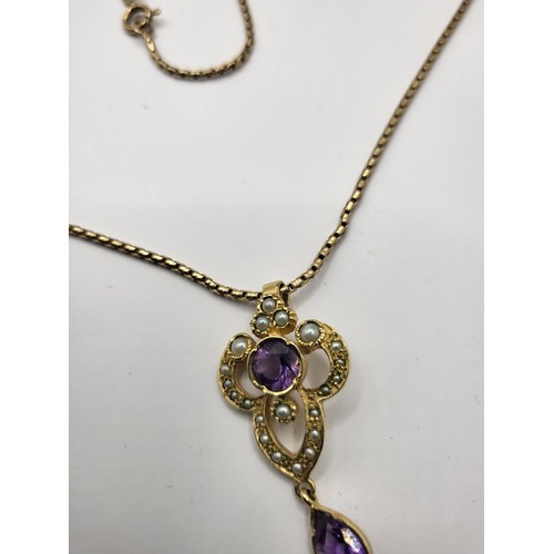 18 - 9ct Gold Amethyst & Seed Pearl Pendant on 9ct Gold Chain Measures 60cm Unclasped Weighs 10.8g Ch... 