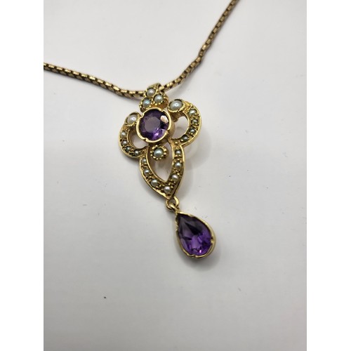 18 - 9ct Gold Amethyst & Seed Pearl Pendant on 9ct Gold Chain Measures 60cm Unclasped Weighs 10.8g Ch... 