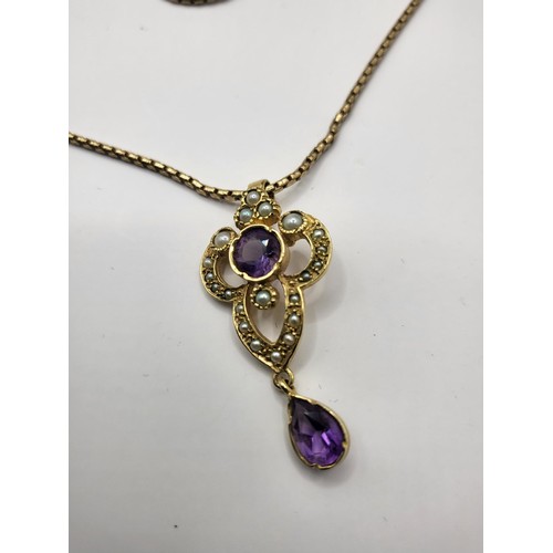 18 - 9ct Gold Amethyst & Seed Pearl Pendant on 9ct Gold Chain Measures 60cm Unclasped Weighs 10.8g Ch... 