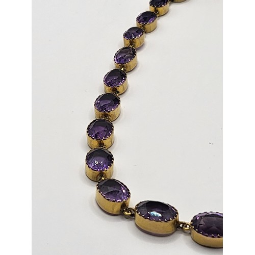 24 - 9ct Gold & Amethyst Necklace Item is Unhallmarked but Electronically Tested Item Measures 38cm U... 