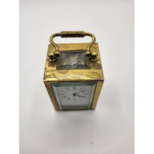 57 - Miniature Brass Carriage Clock in Perfect Working Order Measures 6cm Tall, 4.5cm Across, 4cm Deep