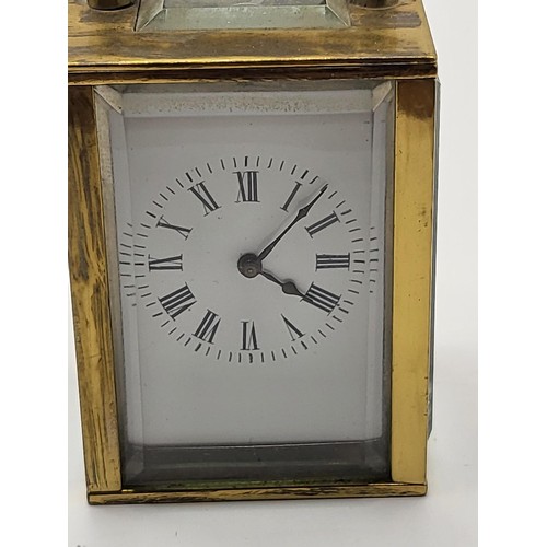 57 - Miniature Brass Carriage Clock in Perfect Working Order Measures 6cm Tall, 4.5cm Across, 4cm Deep