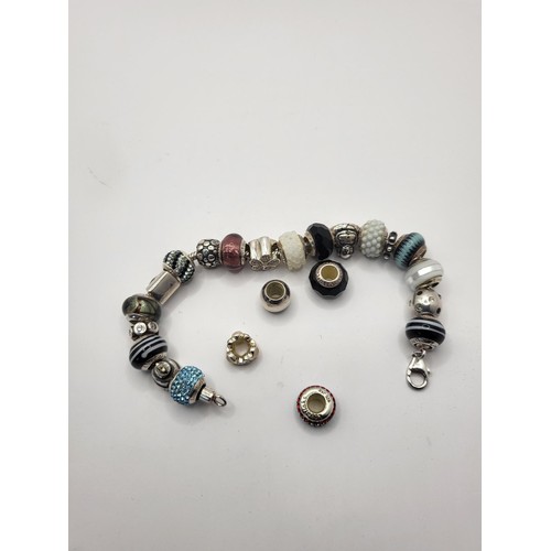 67 - 925 Lovelinks Charm Bracelet & 23 Charms Four which are Not on Bracelet Weighs 75g