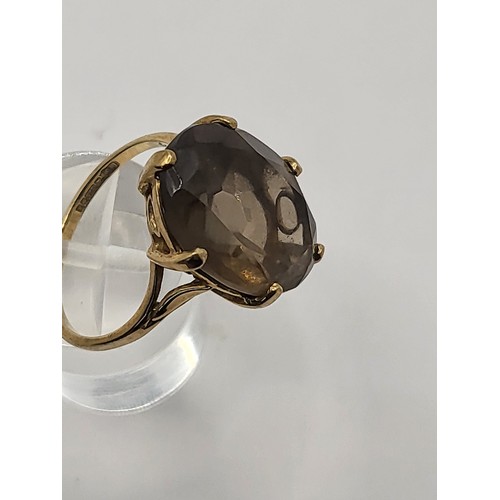 76 - 9ct Gold & Smoky Quartz Size N/O Weighs 4g