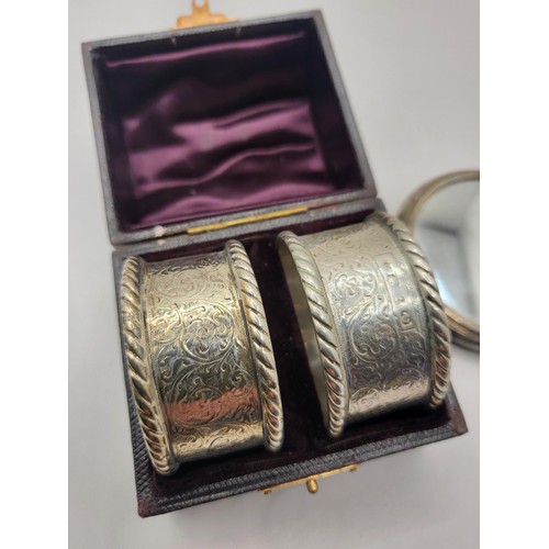 98 - Pair of Sterling Silver Cased Napkin Rings along with Small Miniature Sterling Mirror Napkins Weigh ... 