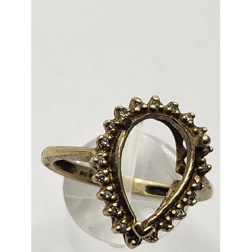 113 - 9ct gold Ring Missing Stone In Middle with Diamonds Around Outer Weighs 3.6g