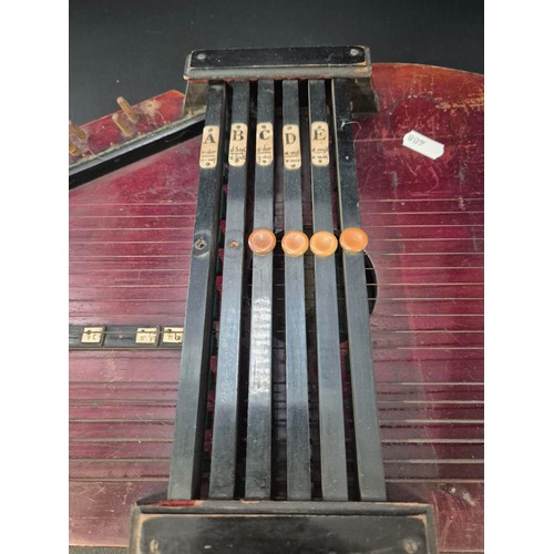 116 - Vintage Muller's Autoharp in a Ebonised Fame